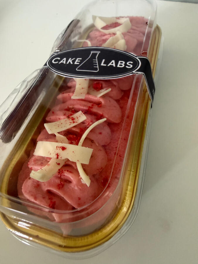 Cake Labs Berry Curious strawberry mini loaf cake with cream cheese frosting.